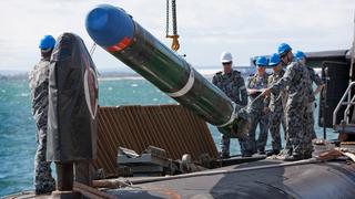 A Submarine Launched Countermeasure Emulator vehicle is embarked onto HMAS Collins at HMAS Stirling