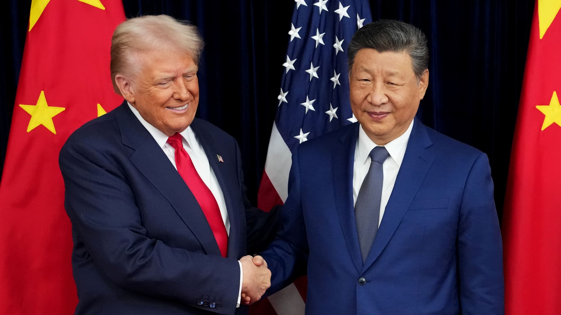 Xi strikes conciliatory tone as he meets Trump in South Korea