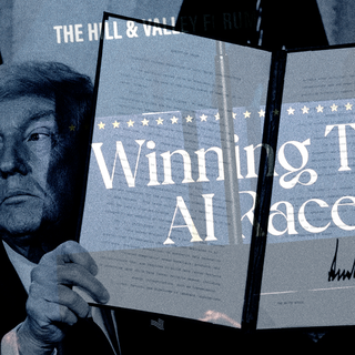 Donald Trump holding up an Executive Order on AI.