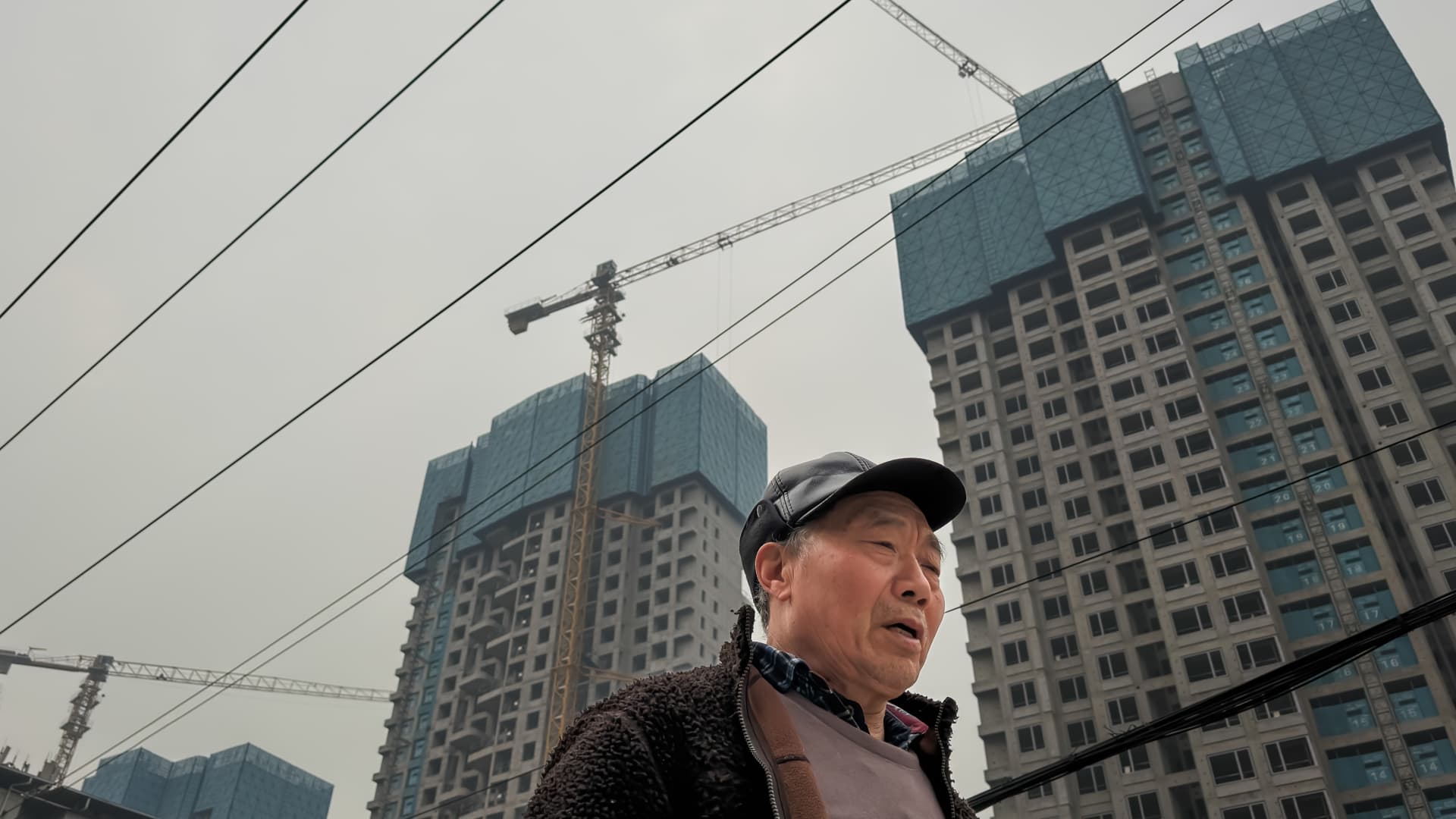 China’s investment crash raises credit risks for homebuilders, banks, government: Fitch